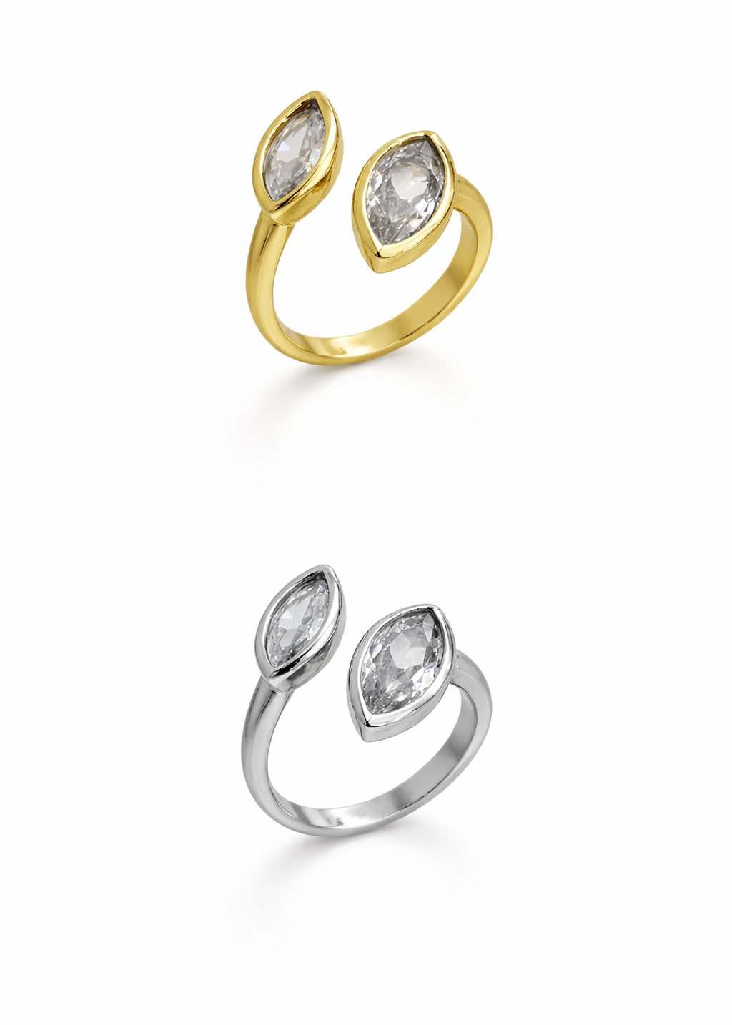 Gold and silver open-backed rings with gemstones on a white background