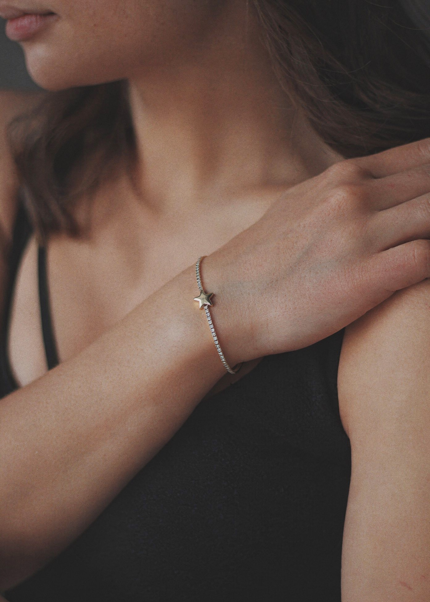 gold plated adjustable bracelet with star charm and sparkle chain