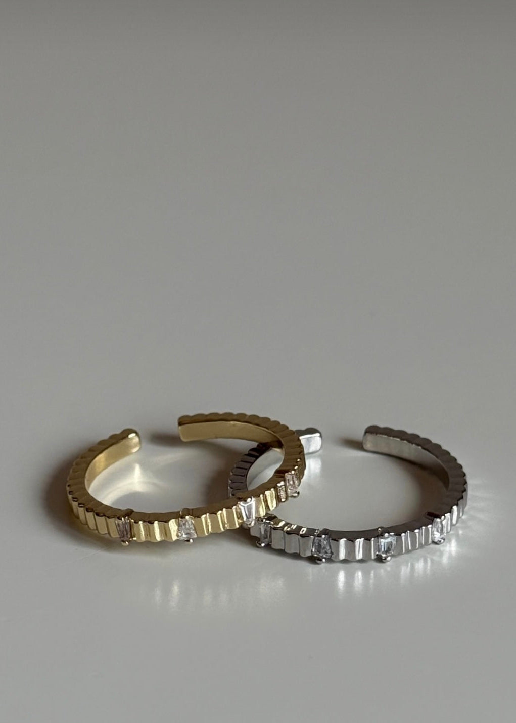 gold plated ridged adjustable ring with crystal details