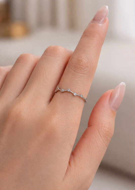 silver plated wave ring with small sparkling details