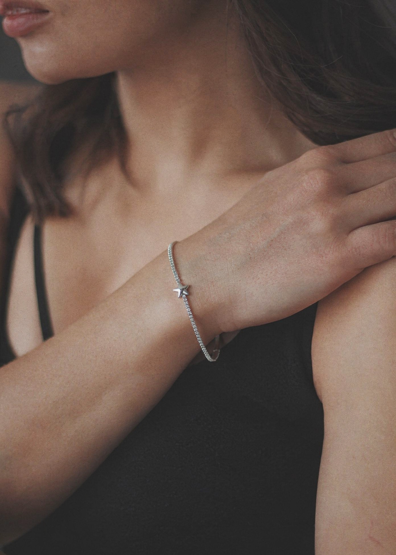 silver plated adjustable bracelet with star charm and sparkle chain