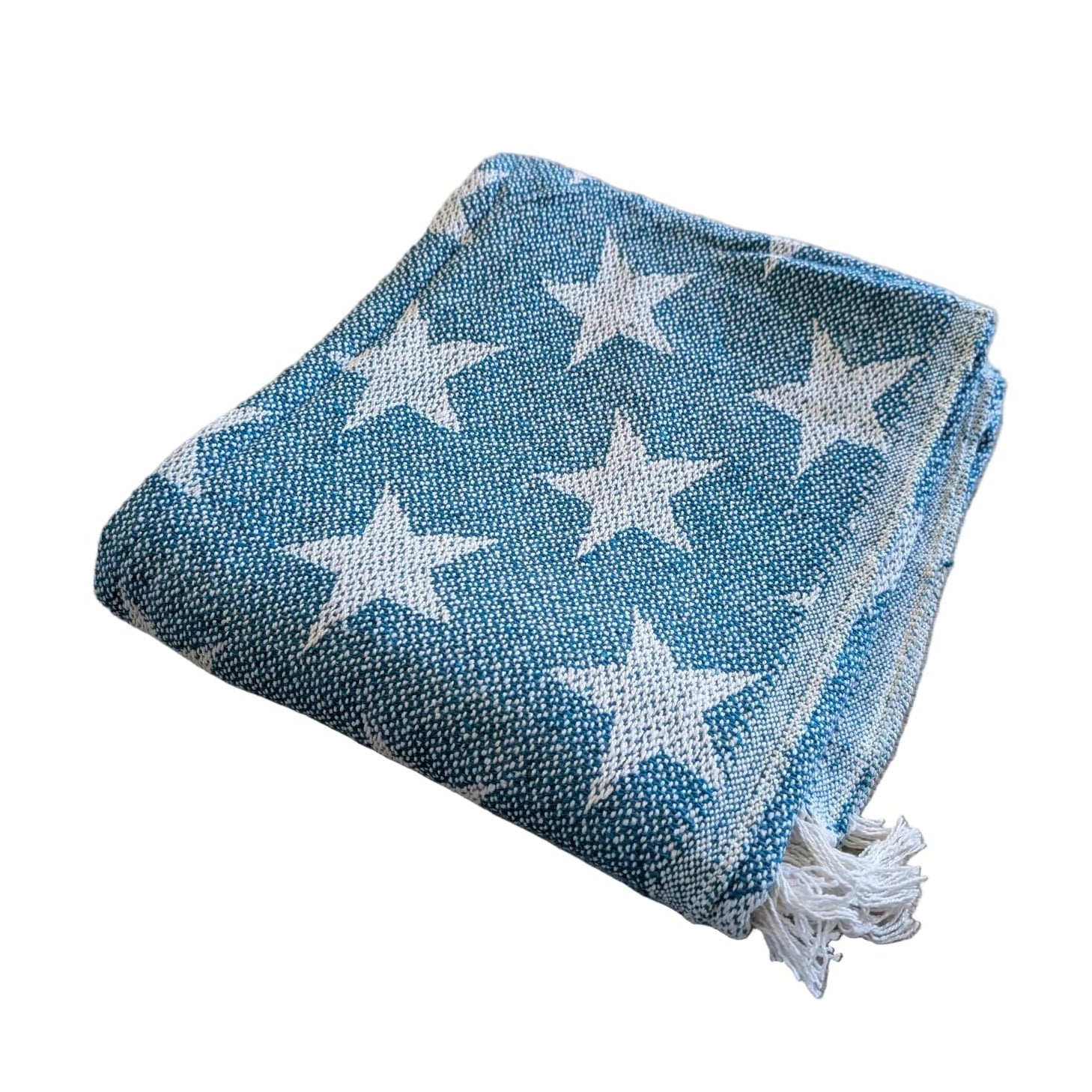 Close-up of blue and white woven cotton blanket reversible design
