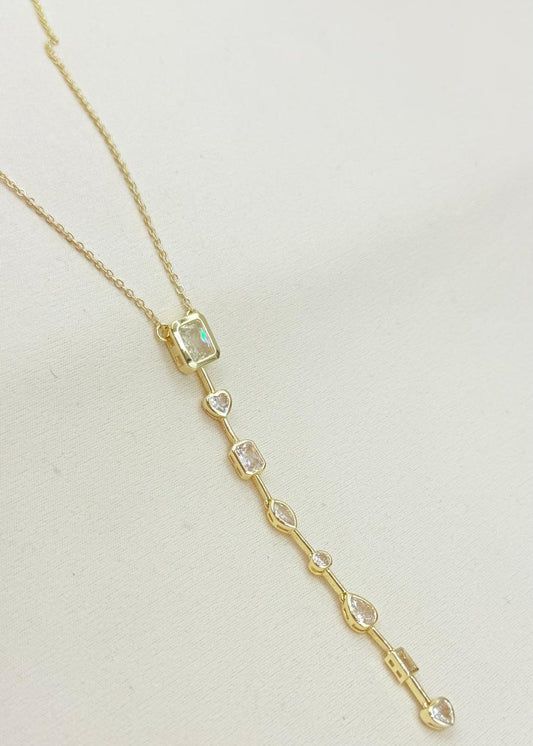 gold multi charm drop necklace with crystal pendant vertical design