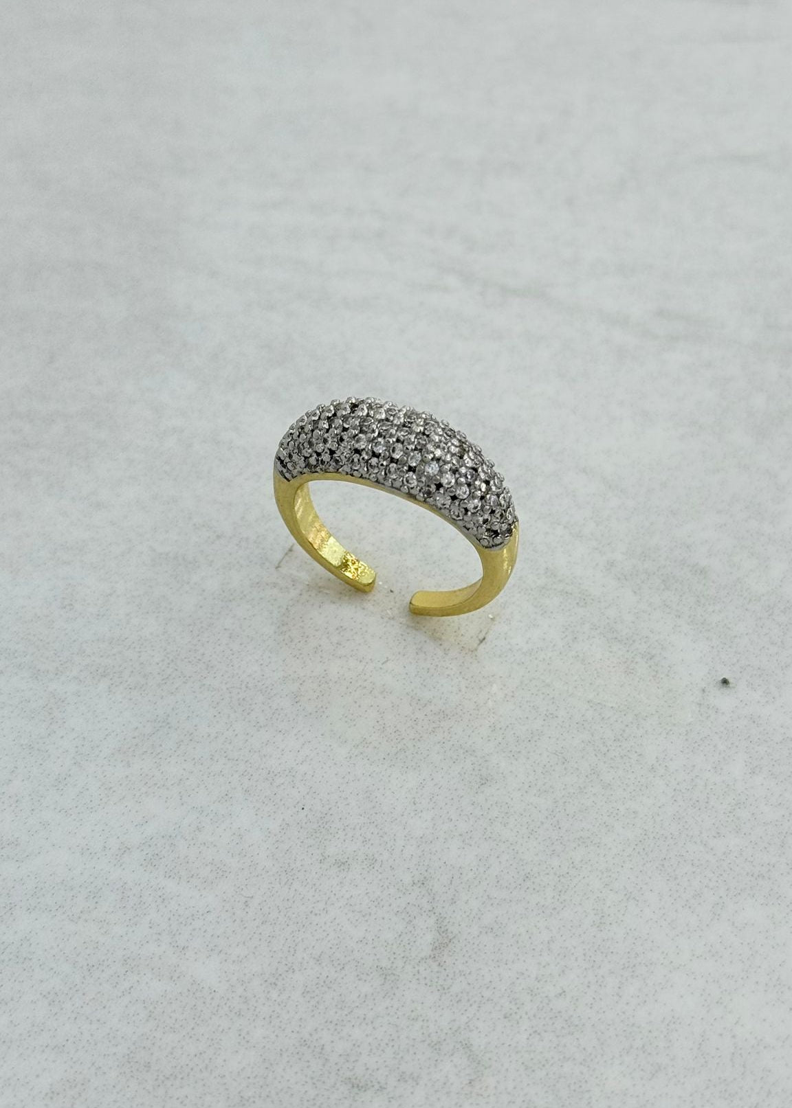 Gold plated pavé zircon pinky ring with adjustable open band and sparkling stones