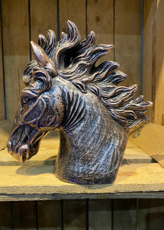 Horse head bronze effect resin sculpture with flowing mane displayed on wooden shelf