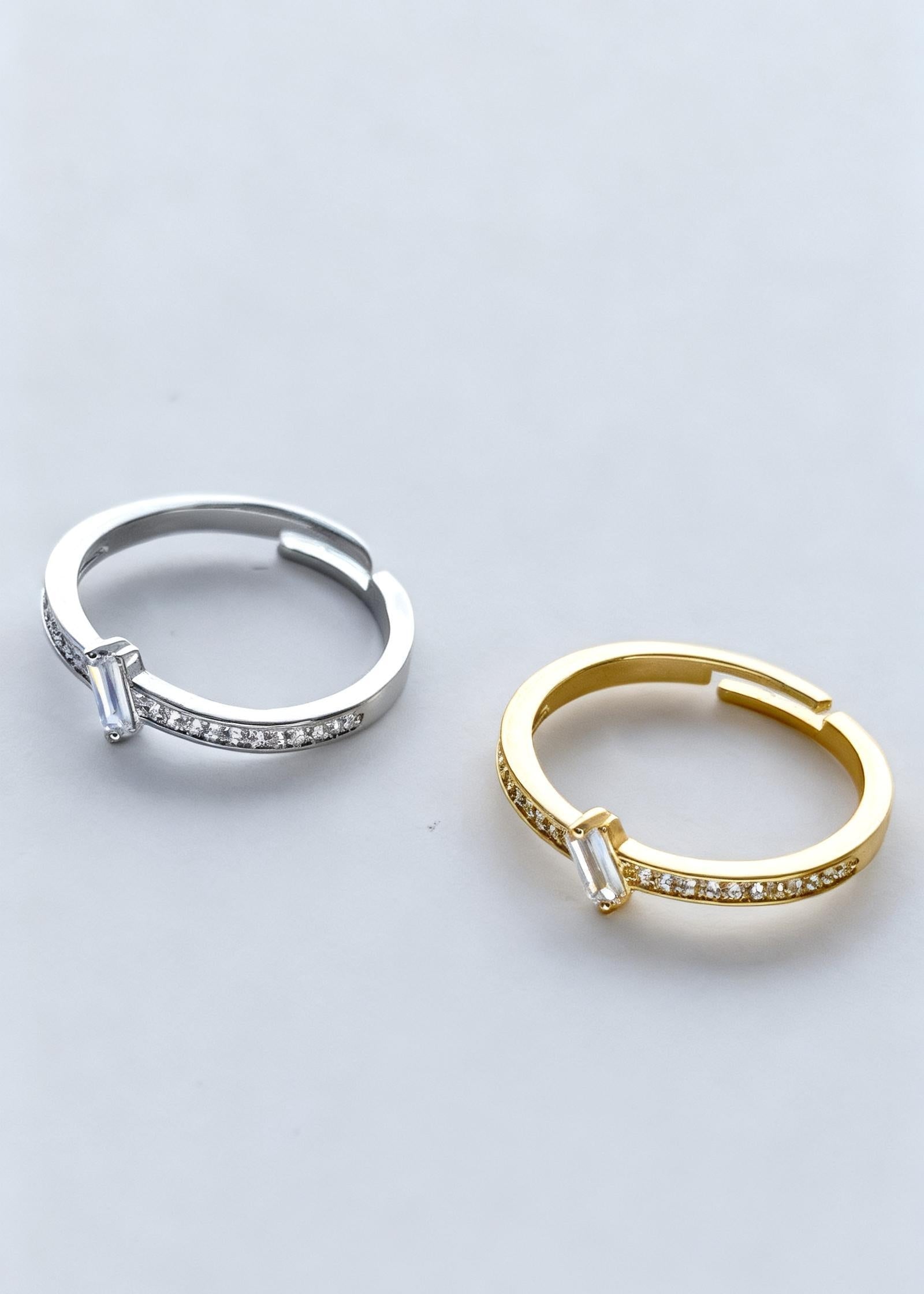 Silver adjustable ring with baguette-cut center stone and sparkling band, minimalist waterproof jewellery
