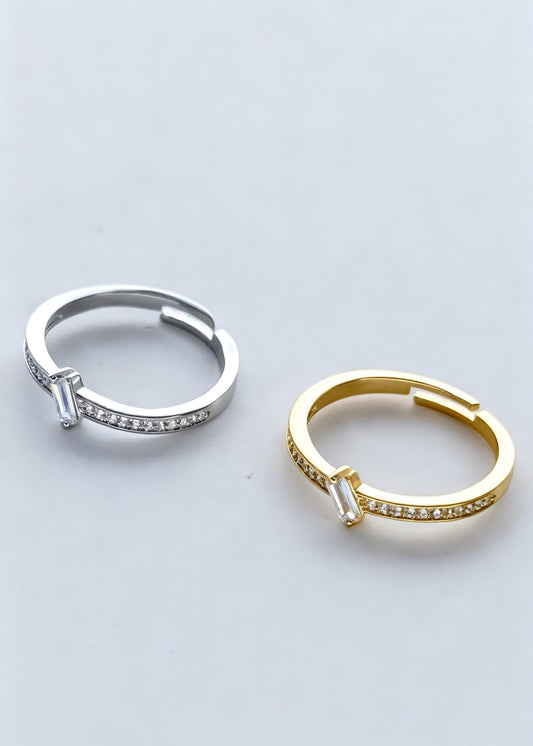 Silver adjustable ring with baguette-cut center stone and sparkling band, minimalist waterproof jewellery