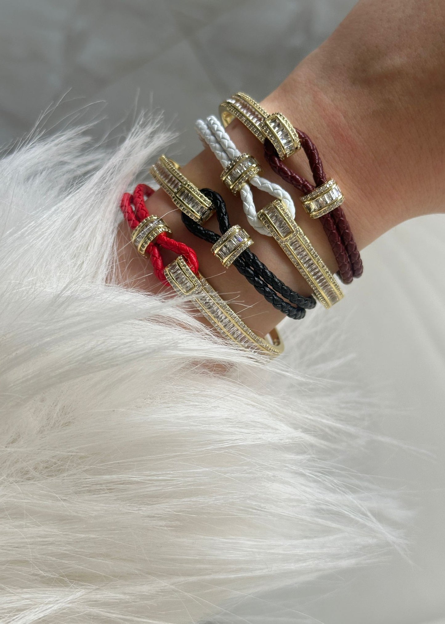 Gold leather cuff bracelet with sparkling stones, luxury gold plated bracelet with braided leather detail