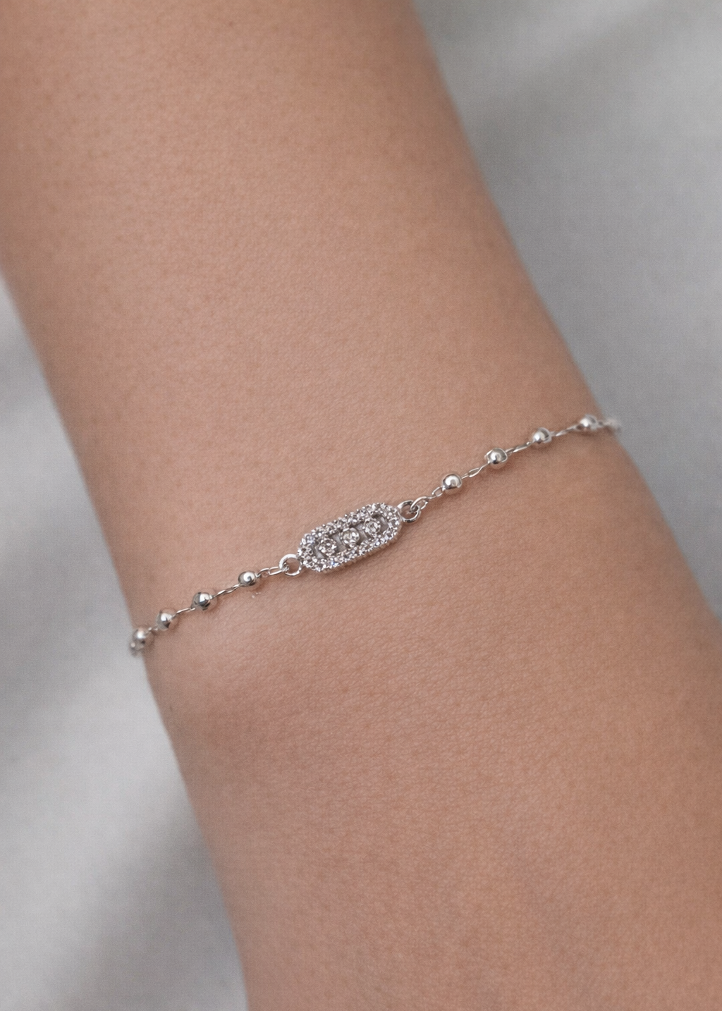 silver plated bracelet with delicate beads and sparkle detail