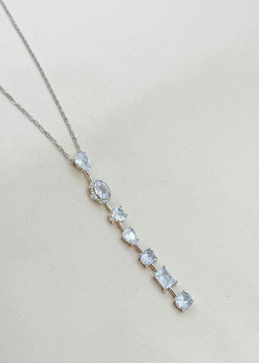 silver multi stone drop necklace with crystal pendant on delicate chain