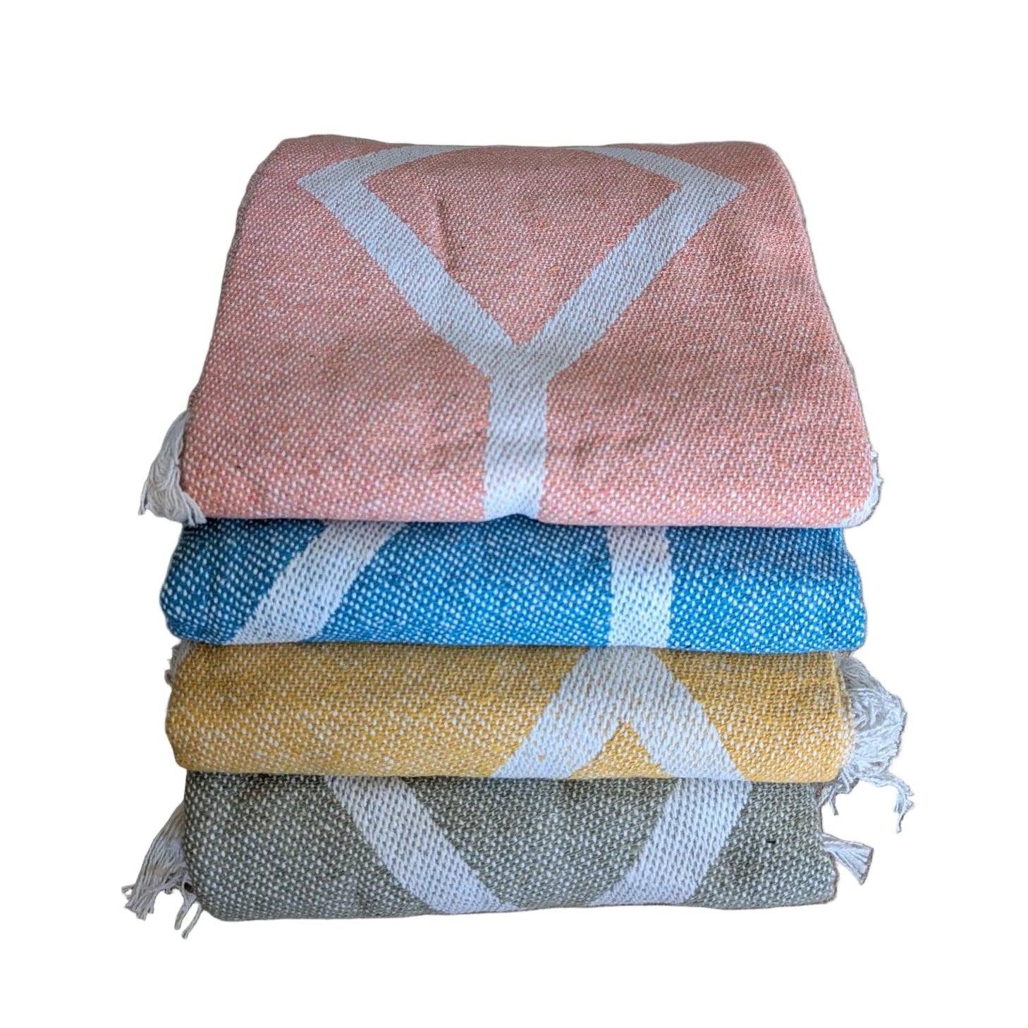 Stack of colorful towels on a brown surface