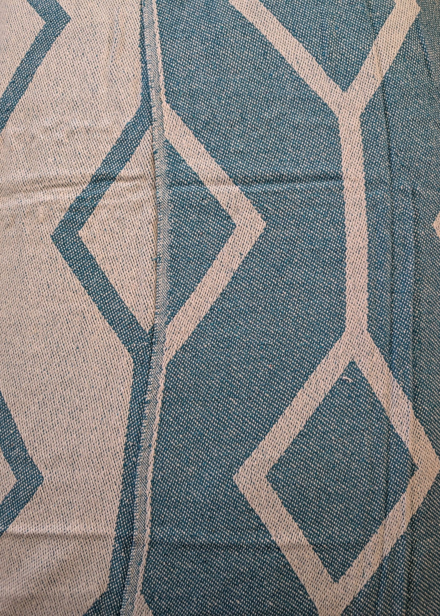 Textile with blue and beige geometric pattern