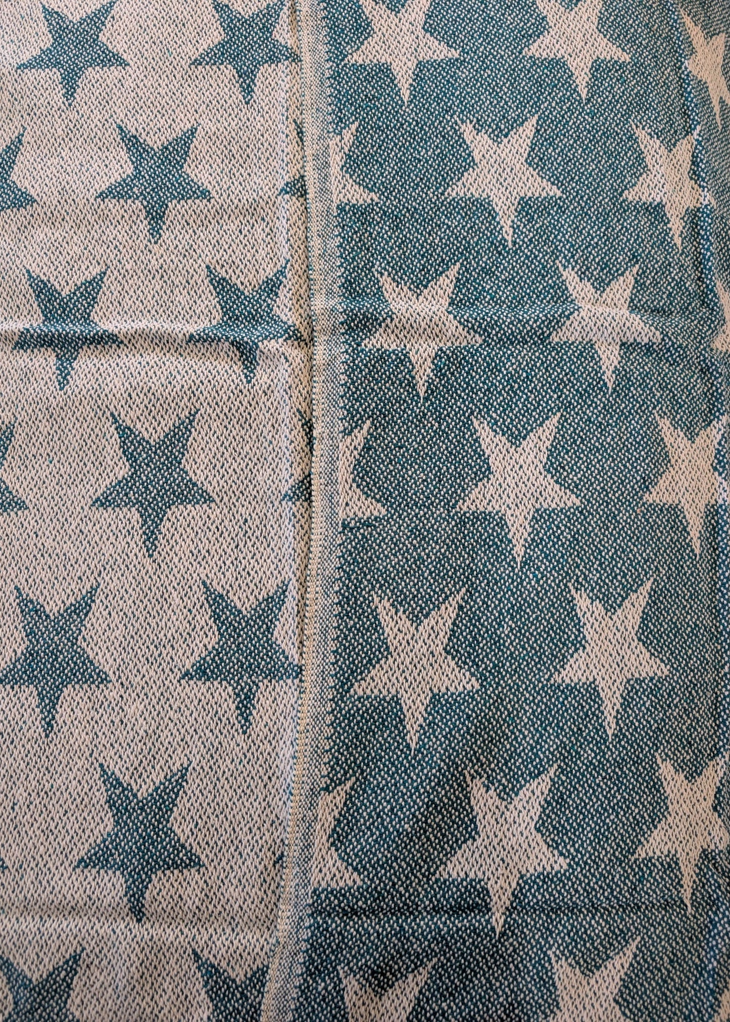Fabric with star pattern in blue and beige