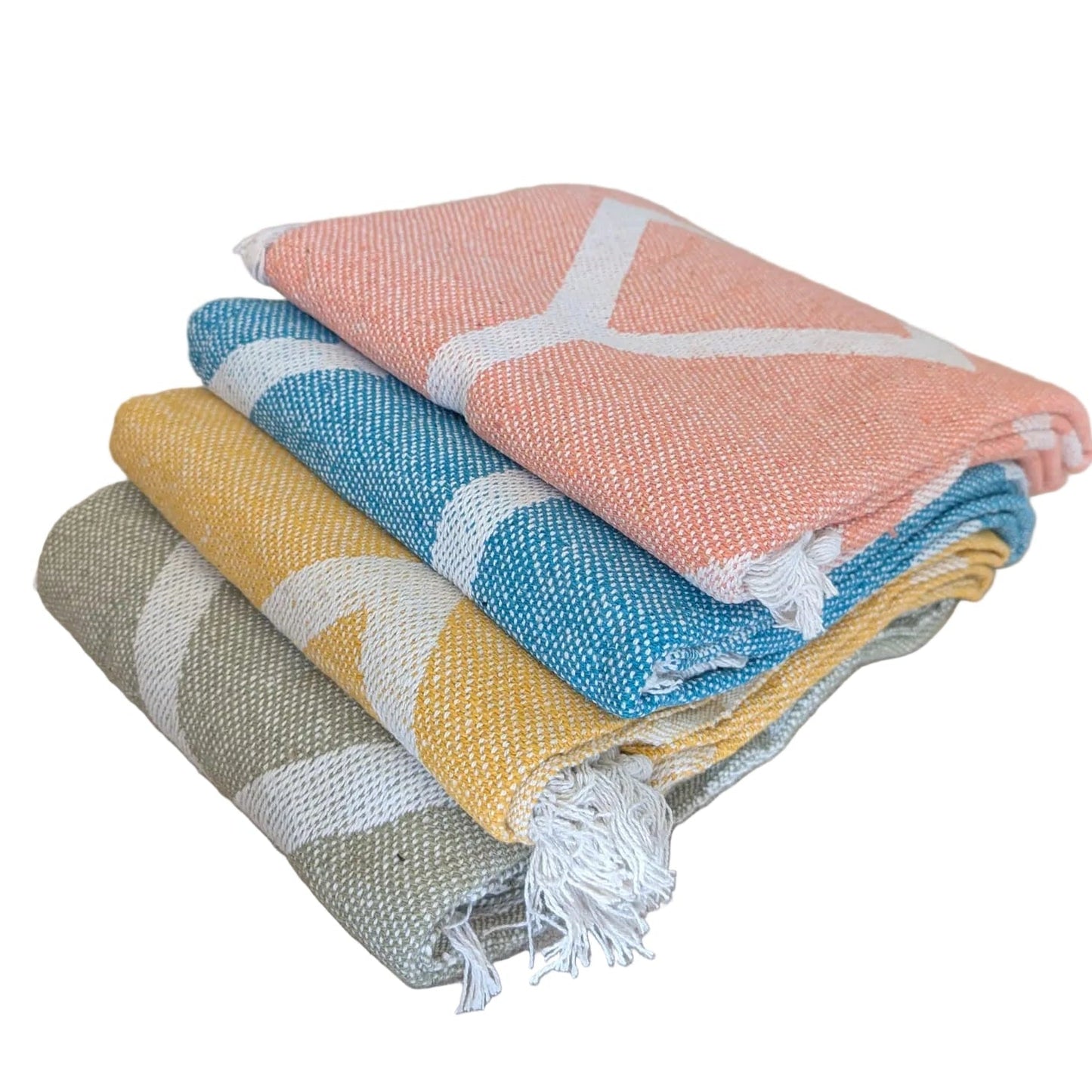 Stack of colorful patterned towels on a white background